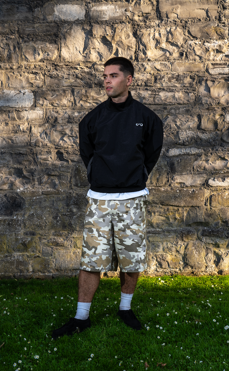 INVISBLE ZIP ASYMMETRIC WINDBREAKER